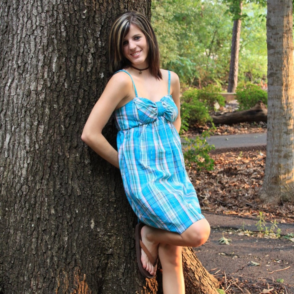 Vibrant turquoise short dress with tiny straps.